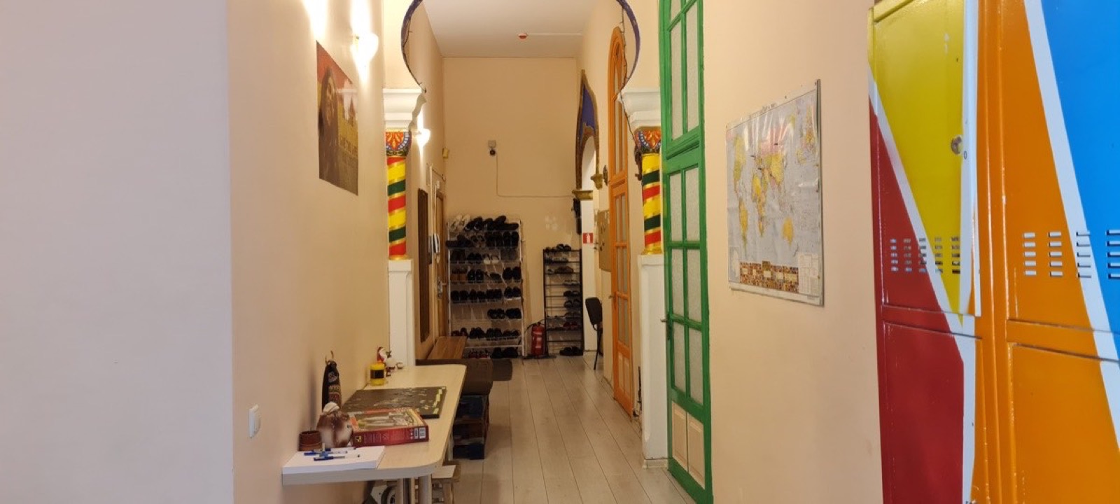 Dja Hostel corridor — lockers and map